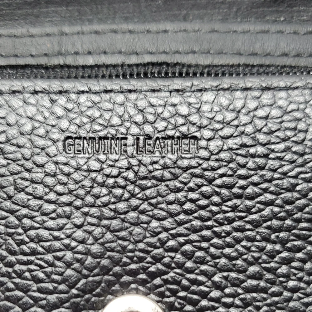 Black Leather Tri-fold Wallet With Cross Embrossed On Front
